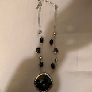 Worn once NY&Co black and silver beaded necklace. Black pendant w/ silver frame
